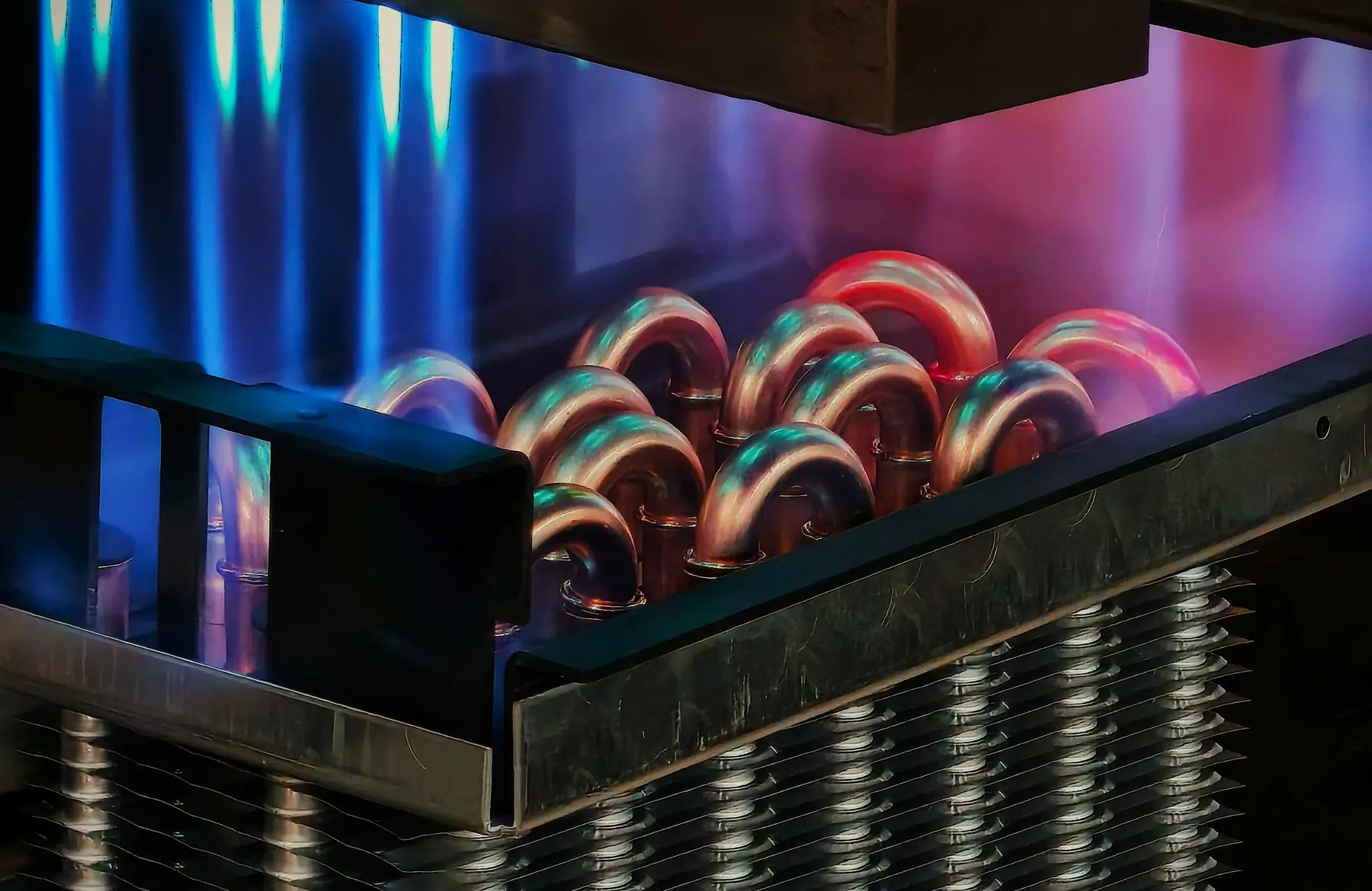 Brazing copper return bends on an aluminium-fin coil
