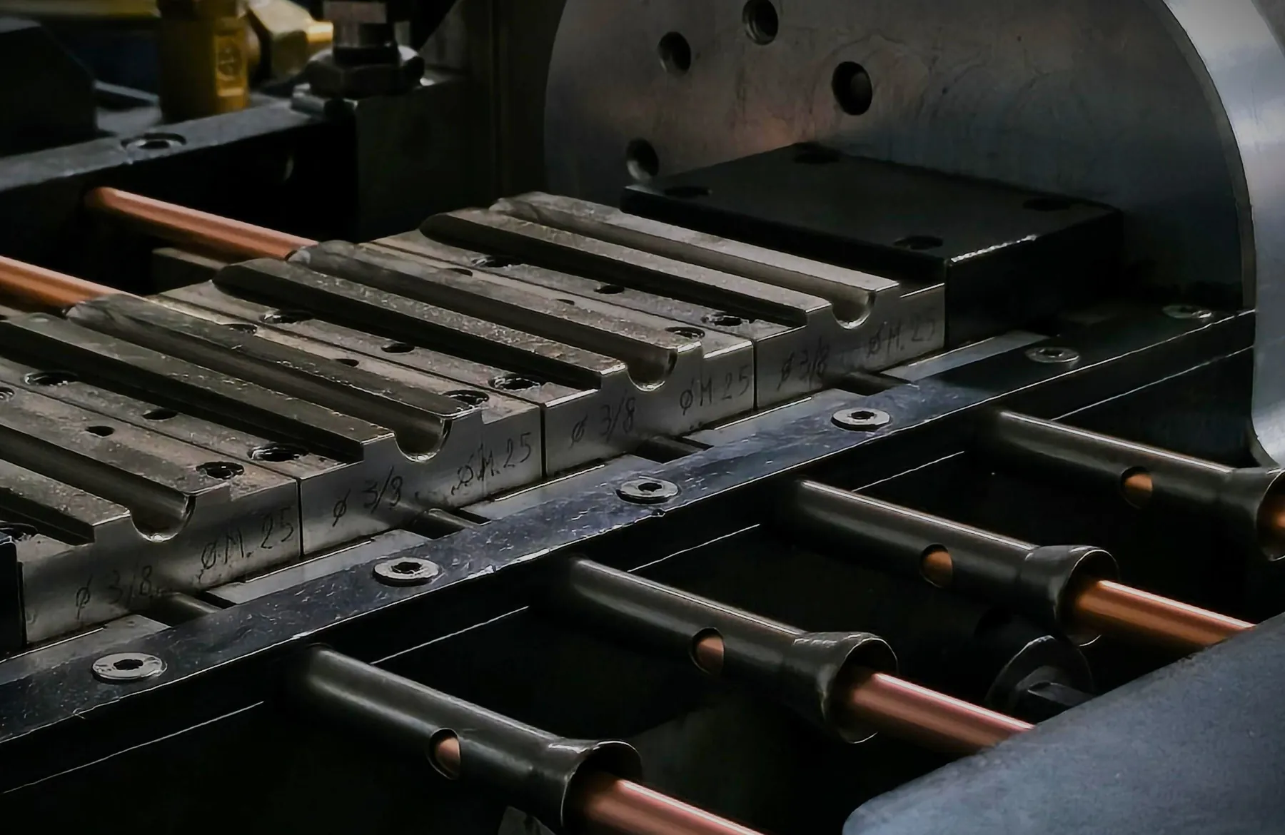 Tube bending tooling with copper tubes on the production line